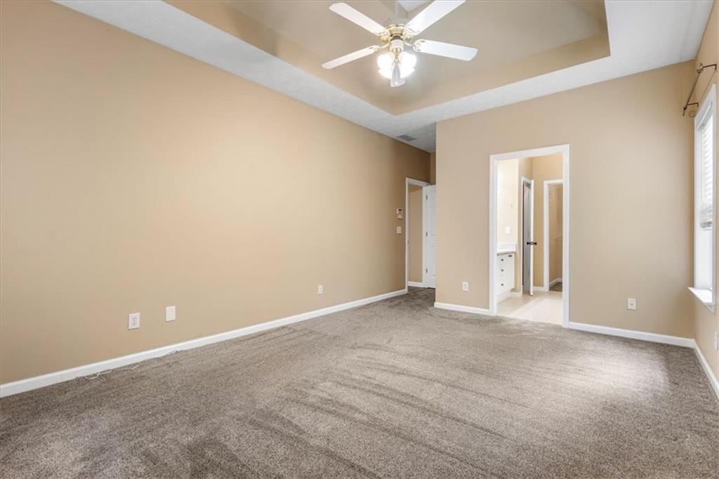 160 Amidon Drive Villa Rica, GA 30180 - Photo 13 of 39 a view of an empty room with a fan