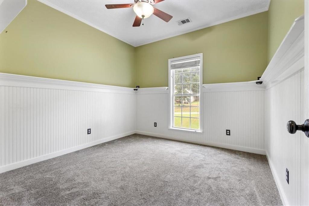 160 Amidon Drive Villa Rica, GA 30180 - Photo 17 of 39 a view of an empty room with a window