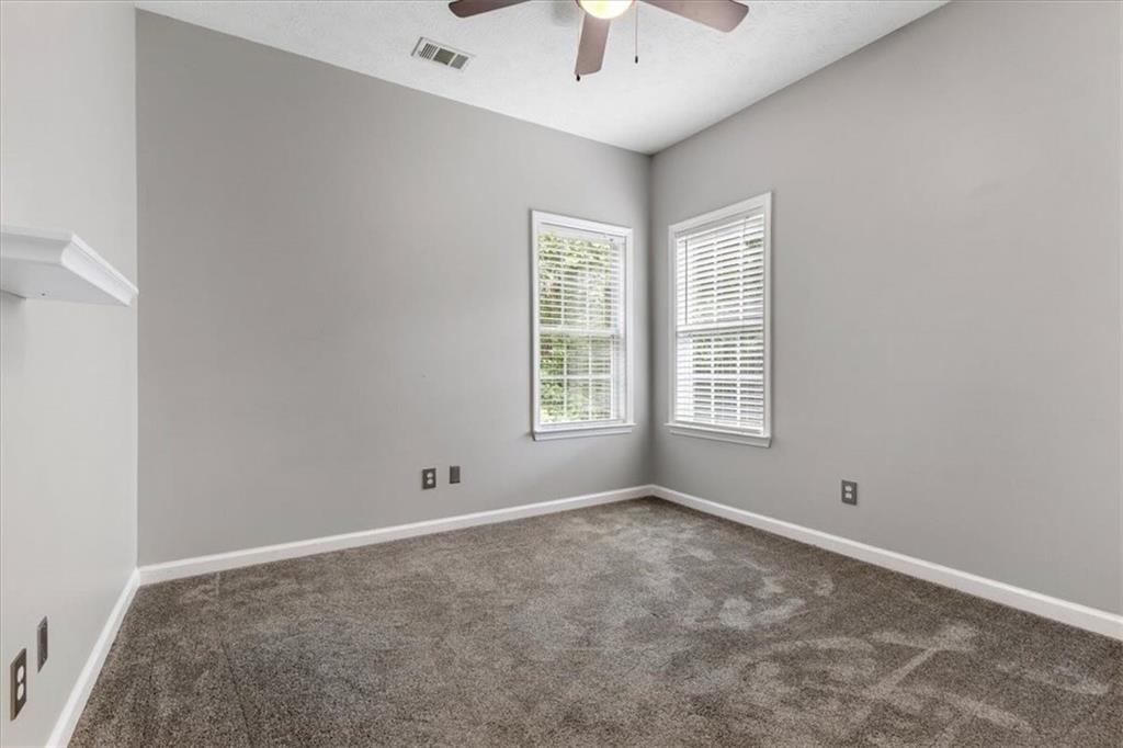 160 Amidon Drive Villa Rica, GA 30180 - Photo 19 of 39 a view of room with window and a ceiling fan