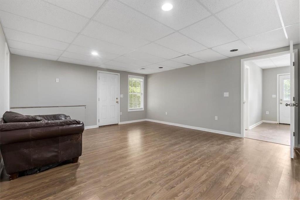 160 Amidon Drive Villa Rica, GA 30180 - Photo 24 of 39 a view of an empty room with wooden floor