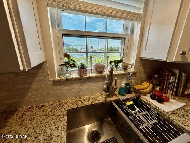 404 South Beach Street, Unit 101 Daytona Beach, FL 32114 - Photo 11 of 35 a room with musical instruments