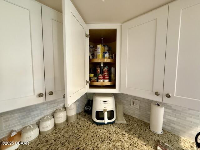 404 South Beach Street, Unit 101 Daytona Beach, FL 32114 - Photo 12 of 35 a bathroom with sink and mirror