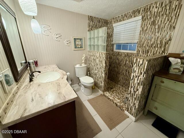 404 South Beach Street, Unit 101 Daytona Beach, FL 32114 - Photo 24 of 35 a bathroom with a sink and mirror with toilet