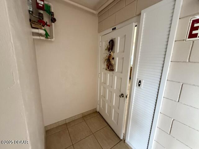 404 South Beach Street, Unit 101 Daytona Beach, FL 32114 - Photo 27 of 35 a view of a hallway with wooden floor and closet