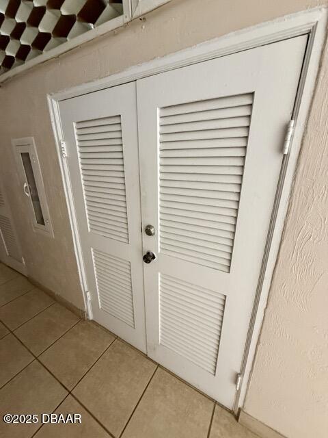404 South Beach Street, Unit 101 Daytona Beach, FL 32114 - Photo 28 of 35 a view of a hallway and closet