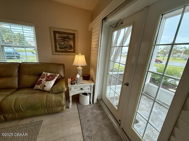 404 South Beach Street, Unit 101 Daytona Beach, FL 32114 - Photo 6 of 35 a living room with furniture and a large window
