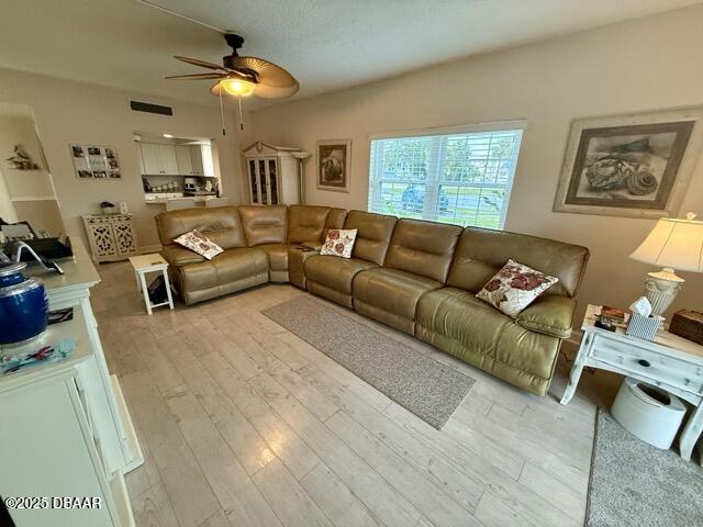 404 South Beach Street, Unit 101 Daytona Beach, FL 32114 - Photo 9 of 35 a living room with furniture and a large window