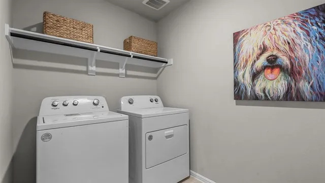 a bedroom with a bed and cabinets