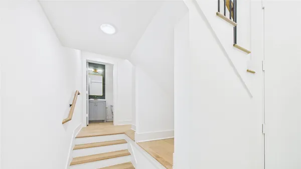 a view of a hallway with white walls