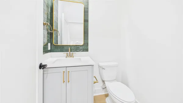 a bathroom with a sink and mirror