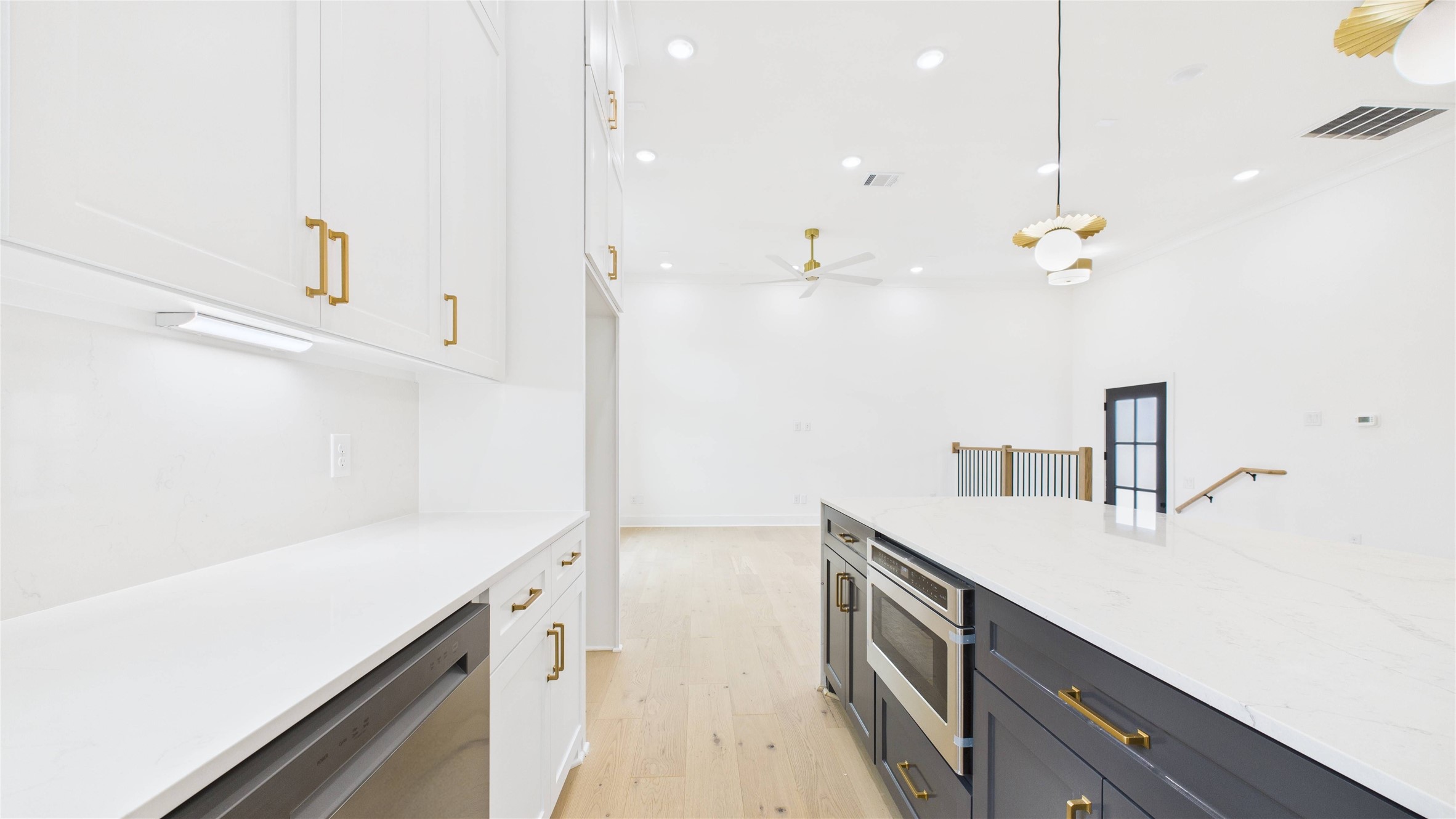 602 Jewett Street, Unit A Houston, TX 77009 - Photo 9 of 46 Under counter lighting, microwave drawer.