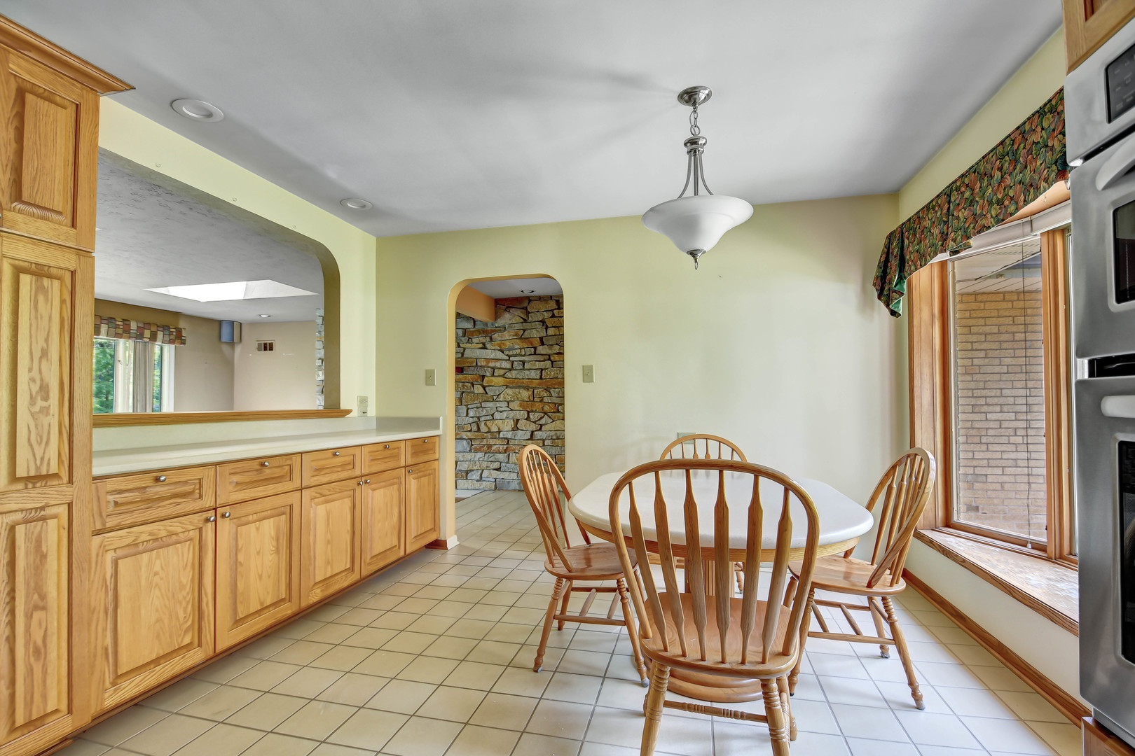 12320 South Ridge Avenue Palos Park, IL 60464 - Photo 11 of 33 a view of a dining room with furniture window and wooden floor