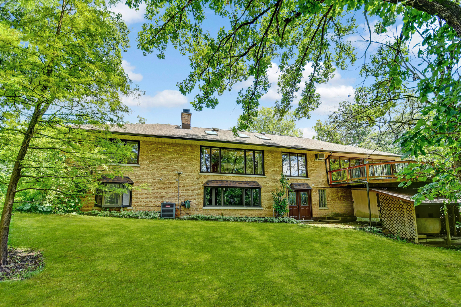 12320 South Ridge Avenue Palos Park, IL 60464 - Photo 29 of 33 a view of a house with a yard