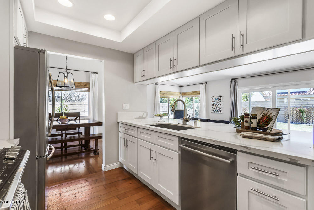 4734 Avedon Road Moorpark, CA 93021 - Photo 15 of 28 a kitchen with sink cabinets and stove