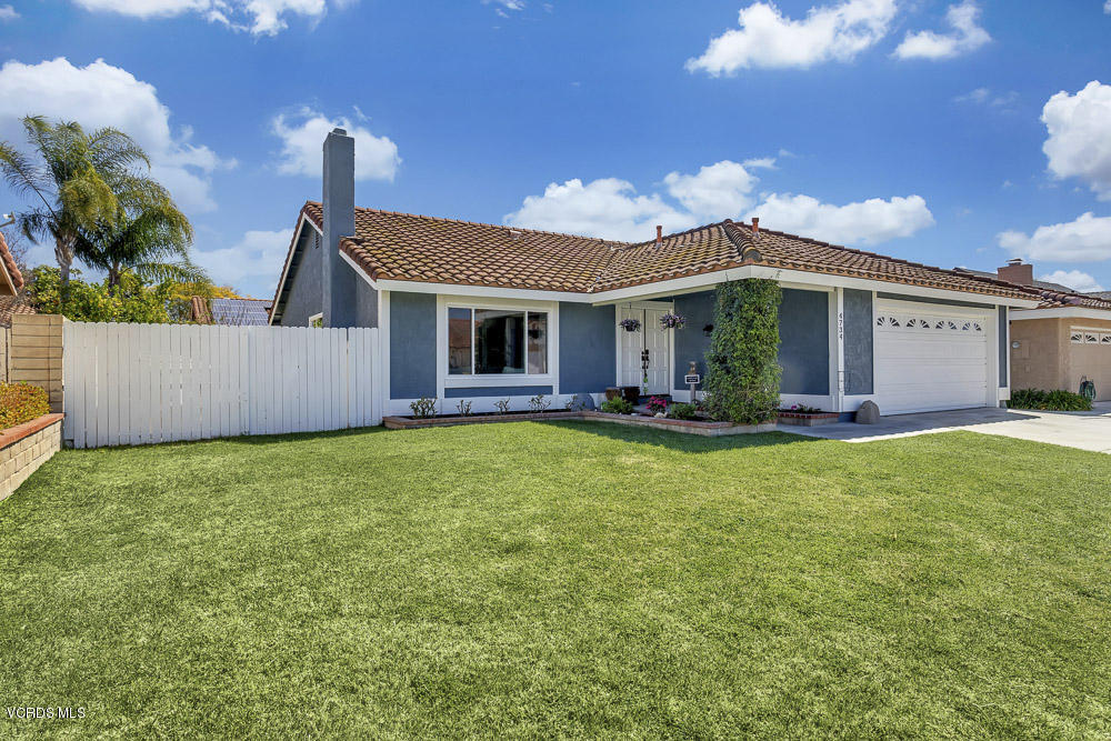 4734 Avedon Road Moorpark, CA 93021 - Photo 3 of 28 a front view of a house with garden