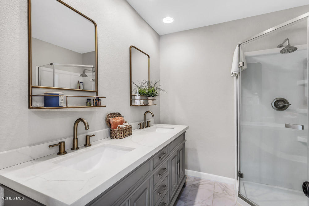 4734 Avedon Road Moorpark, CA 93021 - Photo 24 of 28 a bathroom with a sink and a mirror
