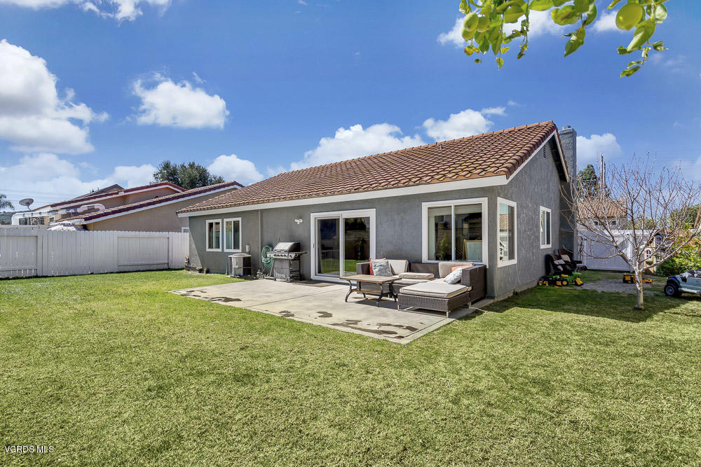 4734 Avedon Road Moorpark, CA 93021 - Photo 26 of 28 a view of a house with backyard sitting area and garden
