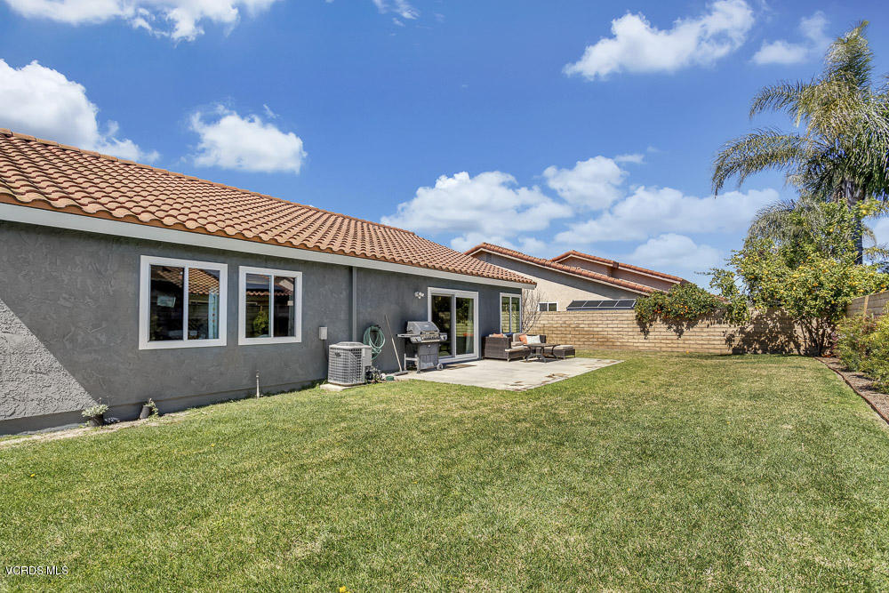 4734 Avedon Road Moorpark, CA 93021 - Photo 27 of 28 a front view of house with yard and porch