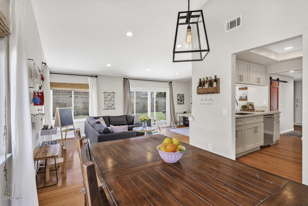 4734 Avedon Road Moorpark, CA 93021 - Photo 10 of 28 a view of a dining room with furniture window and wooden floor
