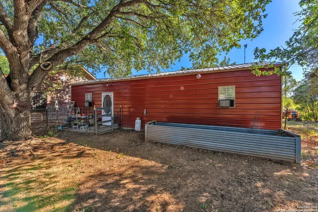 a view of a outdoor space with a tree