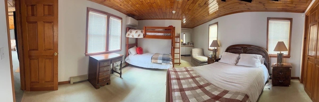 427 Silver Street Middleton, NH 03887 - Photo 19 of 40 a bedroom with bed and a dresser