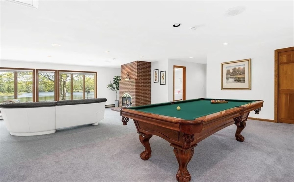 427 Silver Street Middleton, NH 03887 - Photo 29 of 40 a room with pool tables and windows