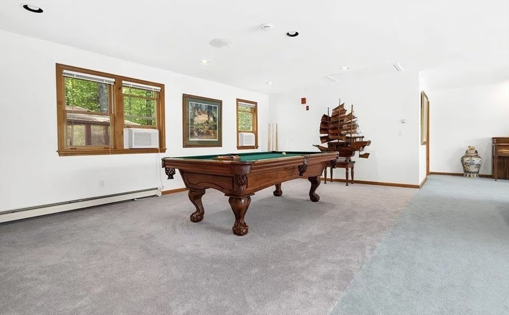 427 Silver Street Middleton, NH 03887 - Photo 30 of 40 a view of a workspace with furniture and a window