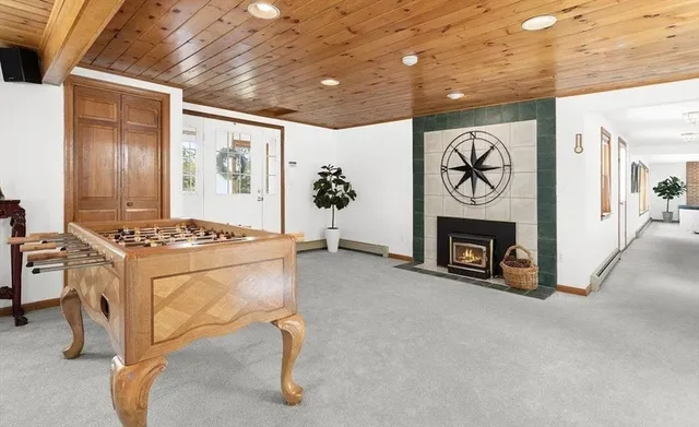 a kitchen with stainless steel appliances granite countertop a stove and a refrigerator