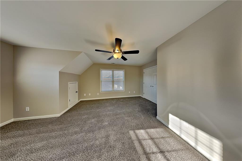 149 Crestview Drive Dallas, GA 30157 - Photo 11 of 24 a view of empty room with ceiling fan