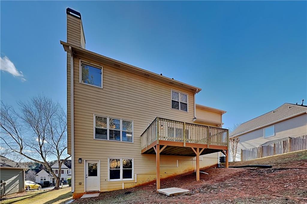 149 Crestview Drive Dallas, GA 30157 - Photo 22 of 24 a view of a house with a yard