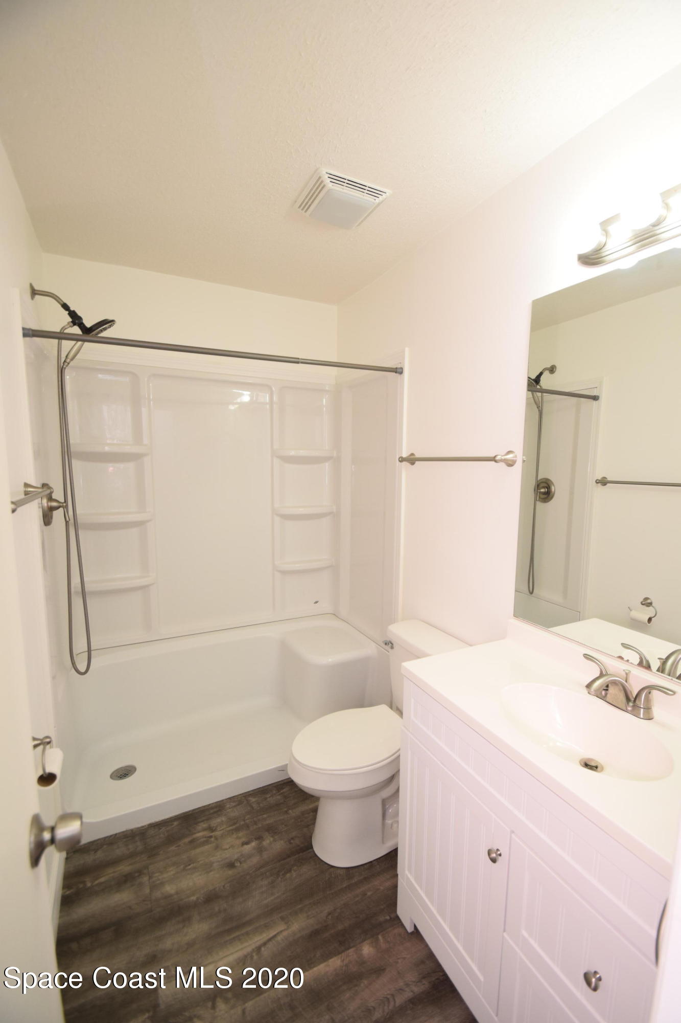 1654 Dawes Road Northeast Palm Bay, FL 32905 - Photo 34 of 47 a bathroom with a sink a toilet and shower