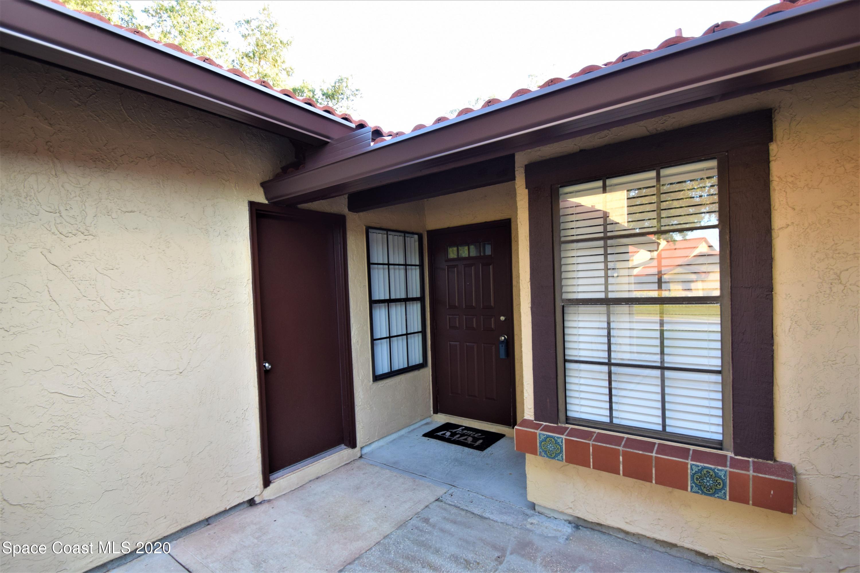 1654 Dawes Road Northeast Palm Bay, FL 32905 - Photo 6 of 47 a view of outdoor space and balcony