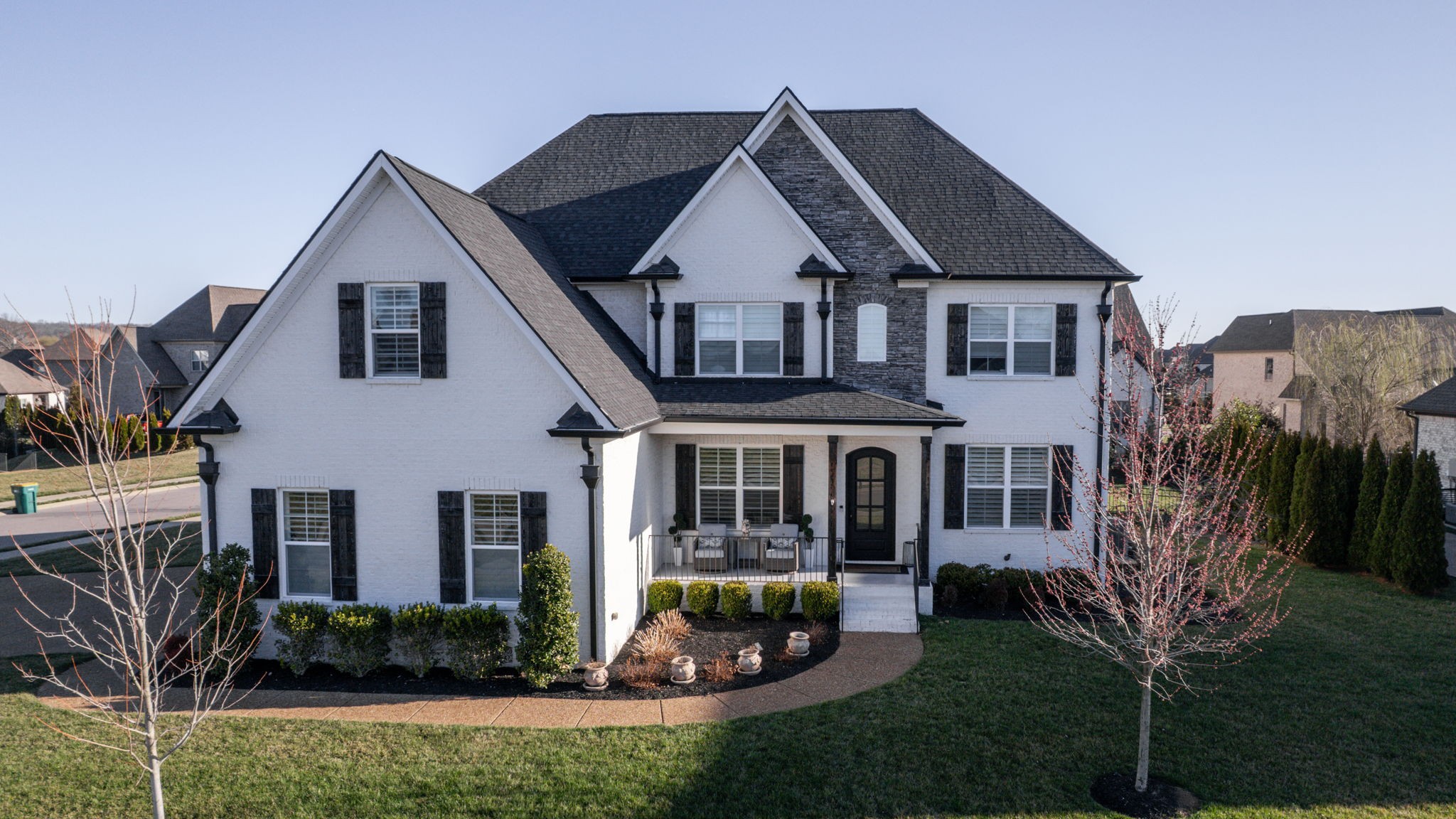 2046 Autumn Ridge Way Spring Hill, TN 37174 - Photo 2 of 65 a front view of a house with a yard