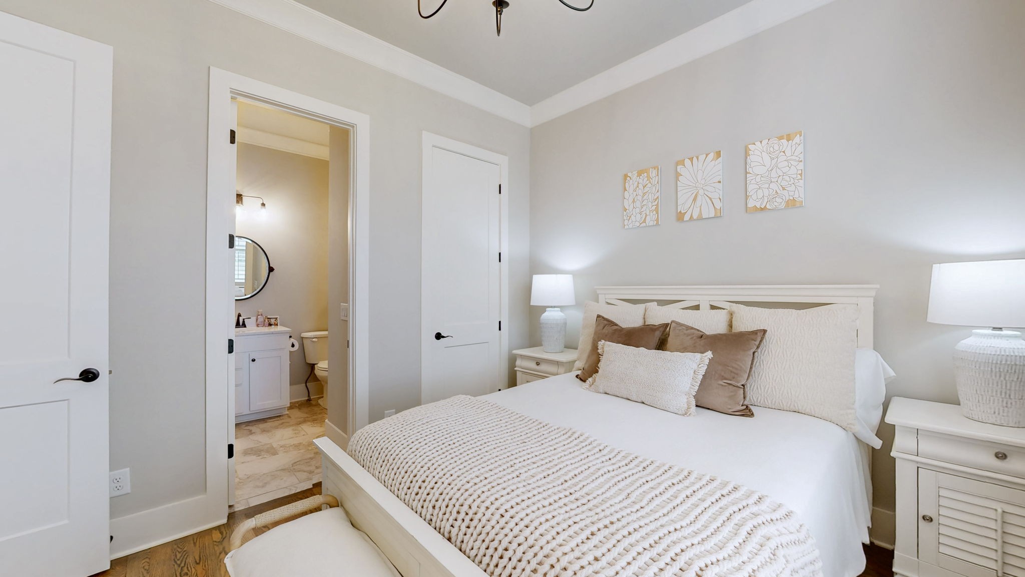 2046 Autumn Ridge Way Spring Hill, TN 37174 - Photo 29 of 65 a bedroom with a bed and a chandelier