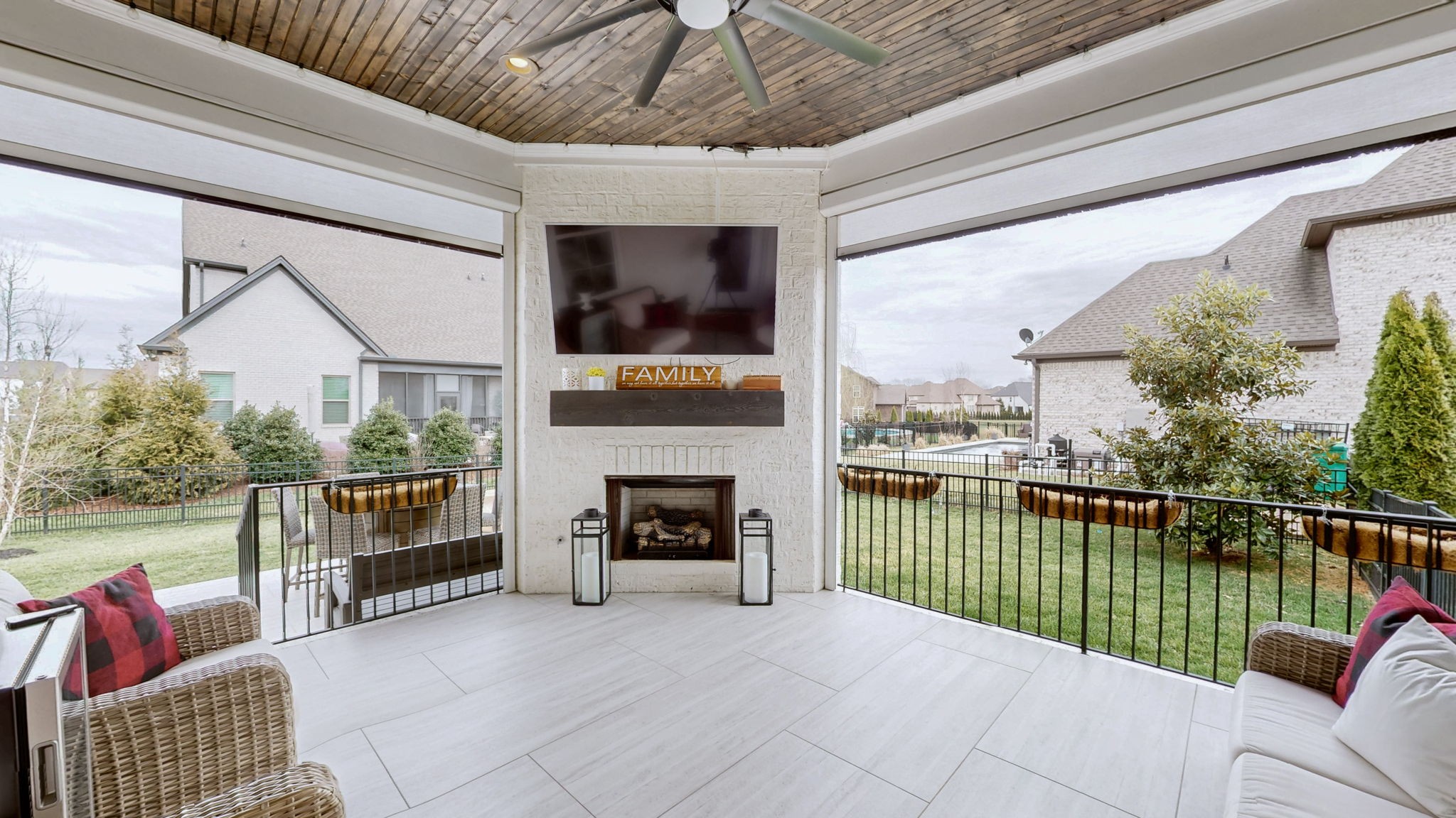 2046 Autumn Ridge Way Spring Hill, TN 37174 - Photo 49 of 65 a balcony with furniture and a fireplace