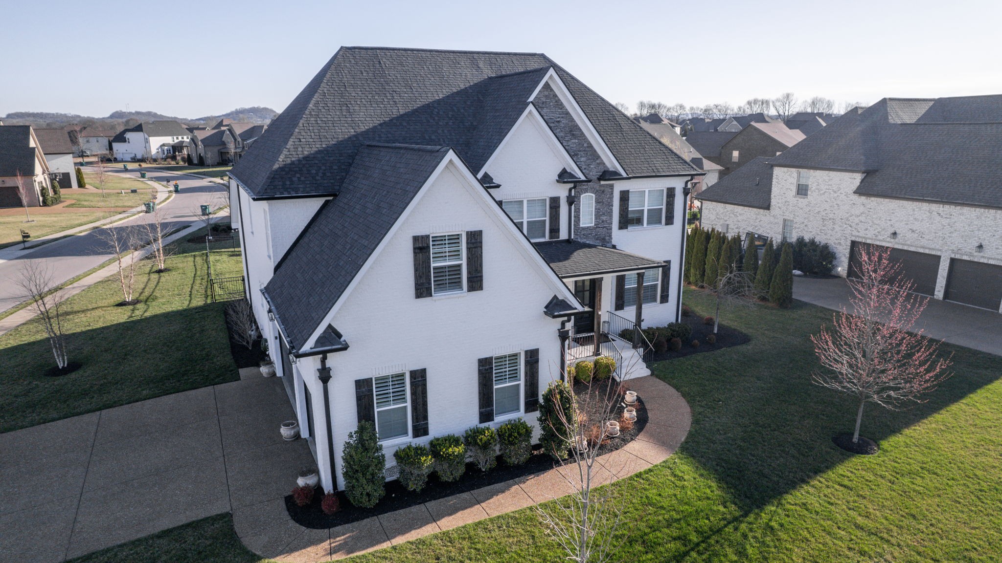 2046 Autumn Ridge Way Spring Hill, TN 37174 - Photo 60 of 65 a aerial view of a house next to a yard