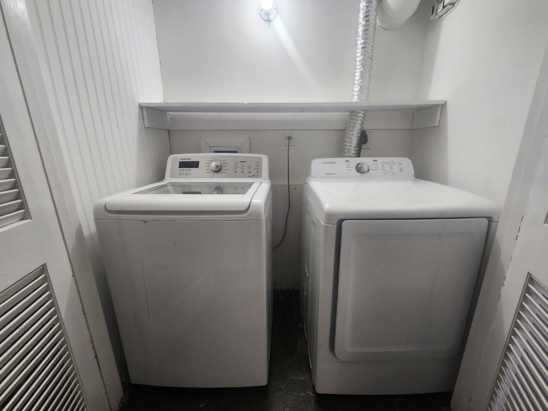 1906 Pennel Road Memphis, TN 38116 - Photo 14 of 38 a utility room with dryer and washer