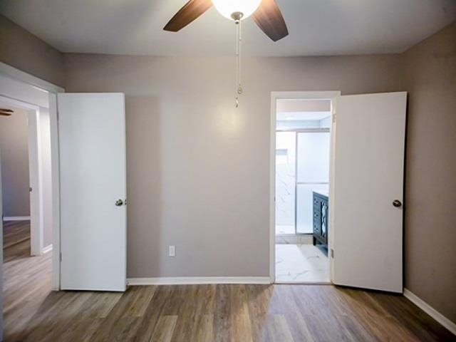 1906 Pennel Road Memphis, TN 38116 - Photo 19 of 38 a view of a room with wooden floor cabinets and entryway