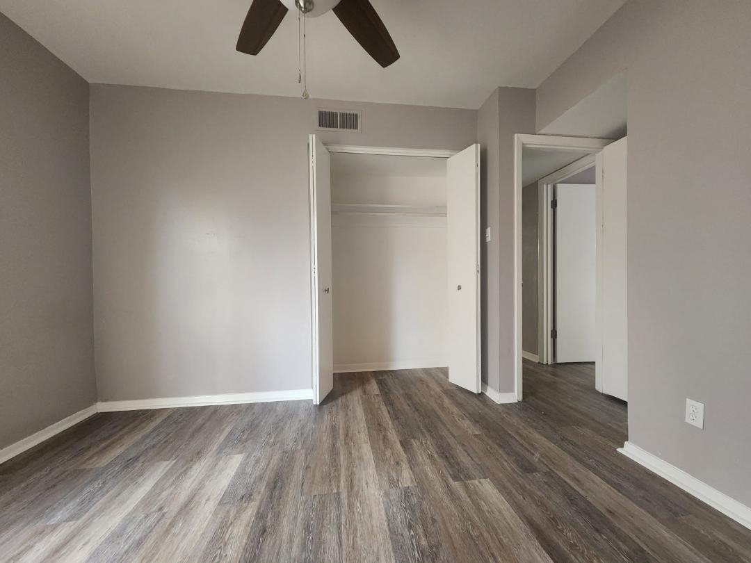 1906 Pennel Road Memphis, TN 38116 - Photo 21 of 38 wooden floor in an empty room