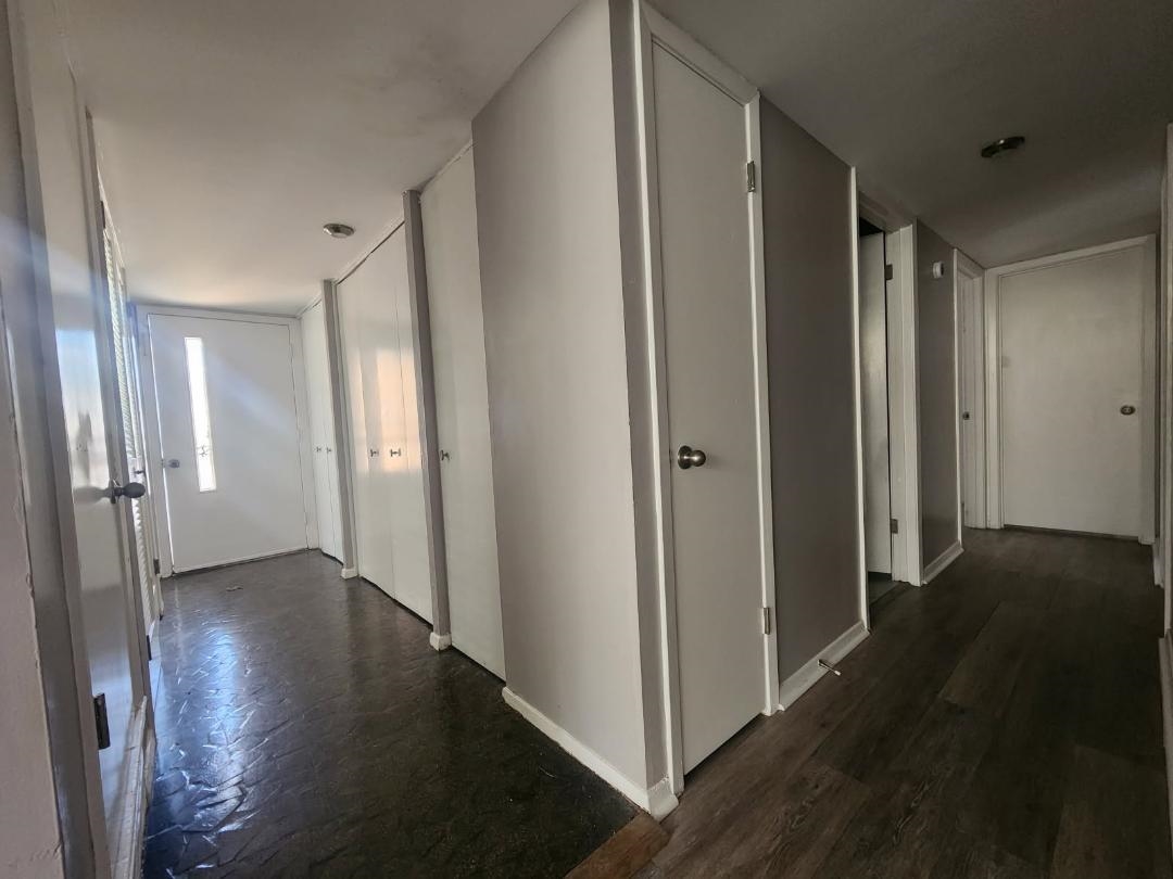 1906 Pennel Road Memphis, TN 38116 - Photo 31 of 38 a view of a hallway with wooden floor