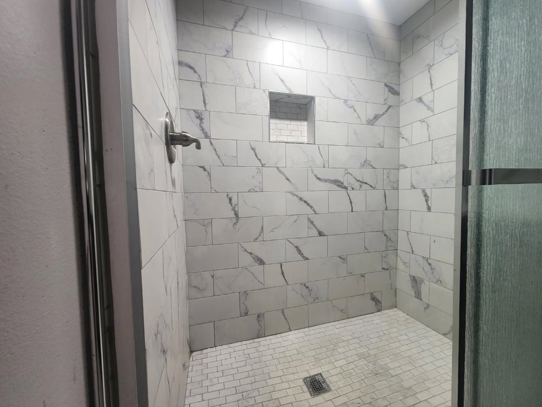1906 Pennel Road Memphis, TN 38116 - Photo 33 of 38 a bathroom with a shower