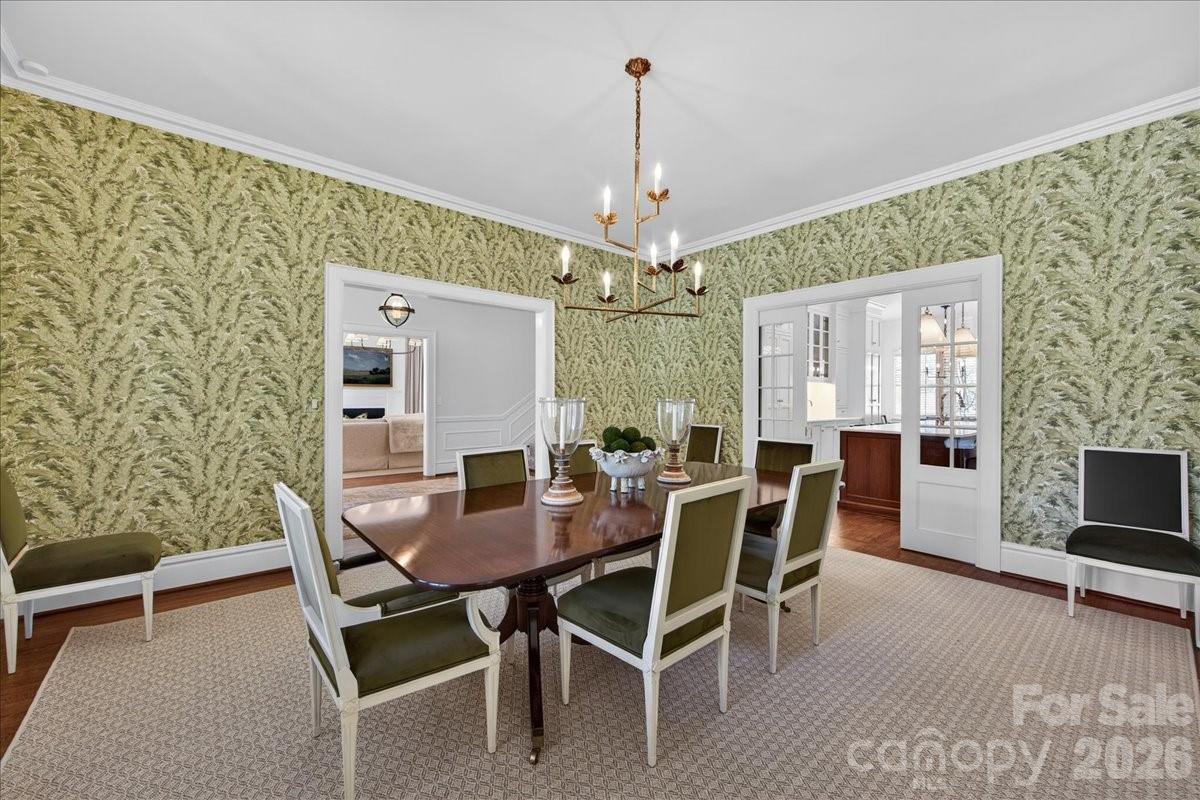 700 Queens Road Charlotte, NC 28207 - Photo 13 of 41 a view of a dining room with furniture