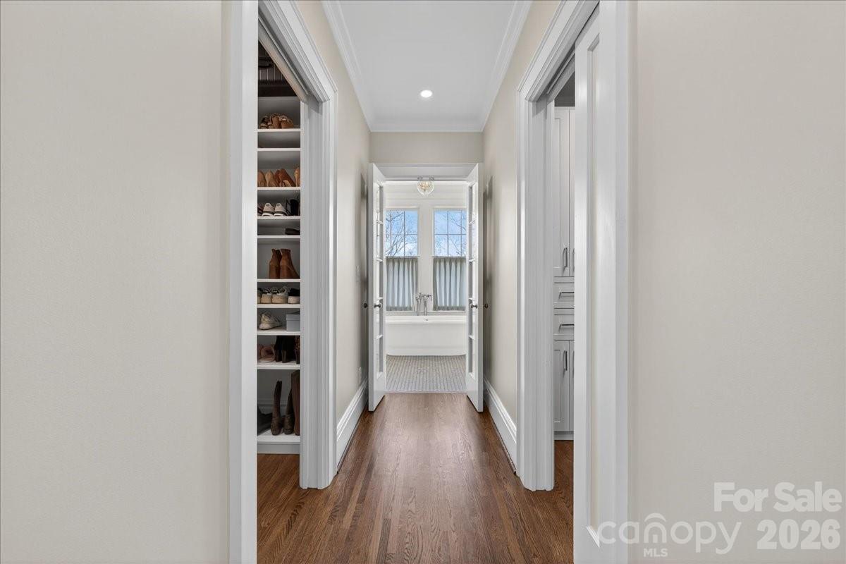 700 Queens Road Charlotte, NC 28207 - Photo 27 of 41 a view of hallway with wooden floor and staircase