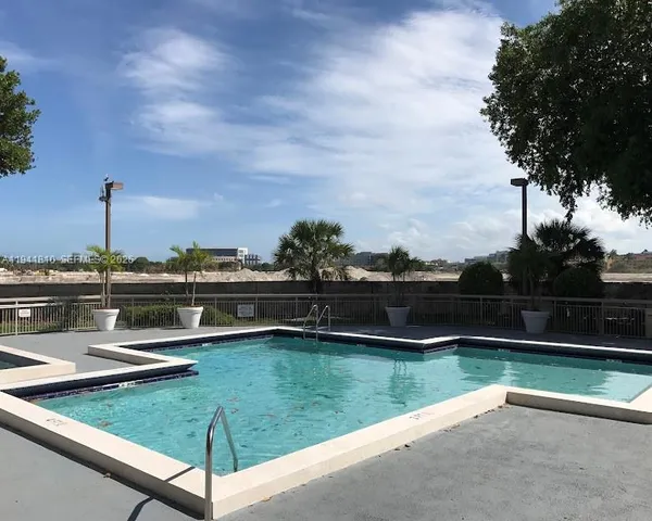 a view of lake with green space