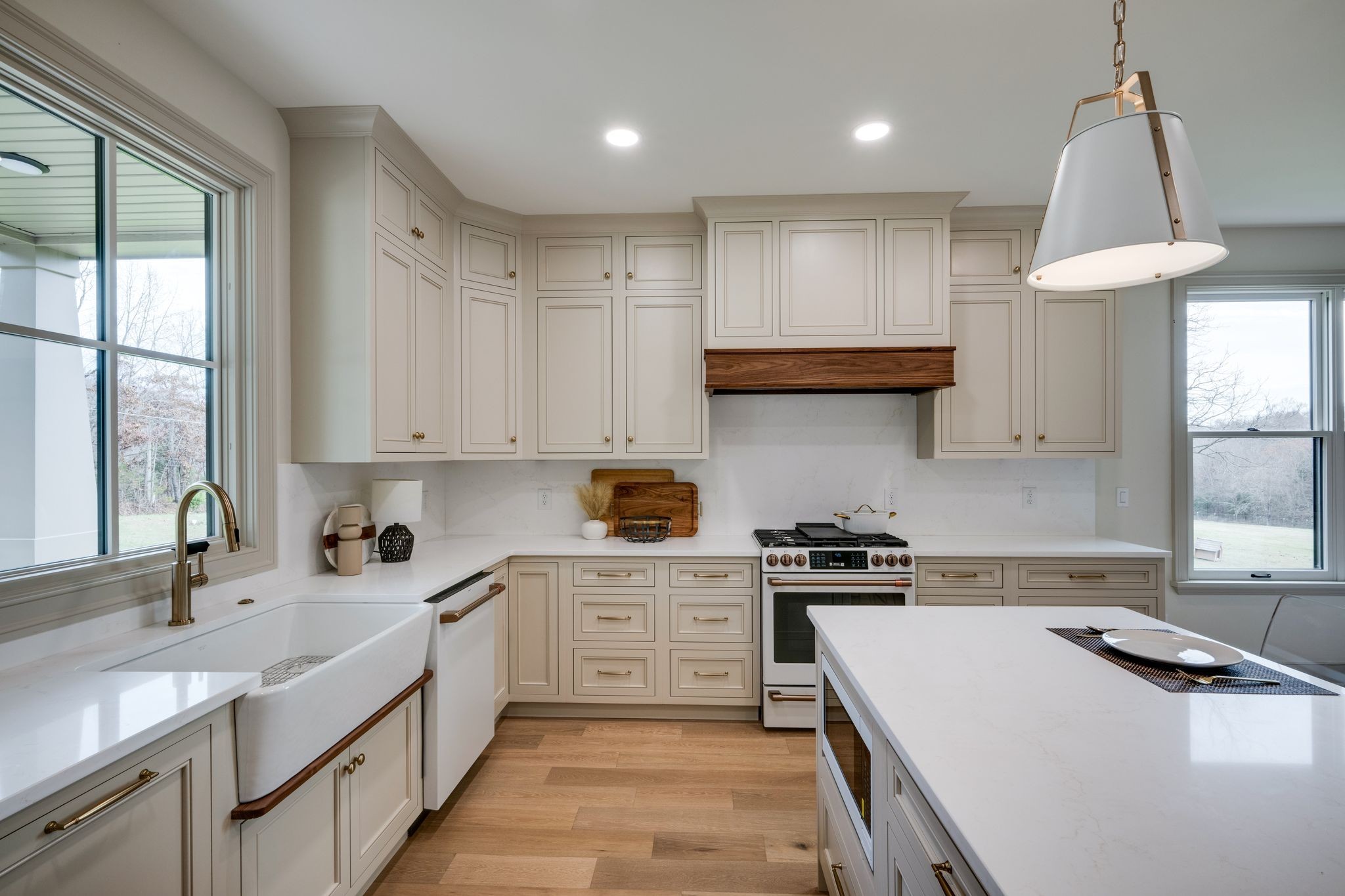 924 Hafner Road Charlotte, TN 37036 - Photo 13 of 79 a kitchen with a sink a stove and cabinets