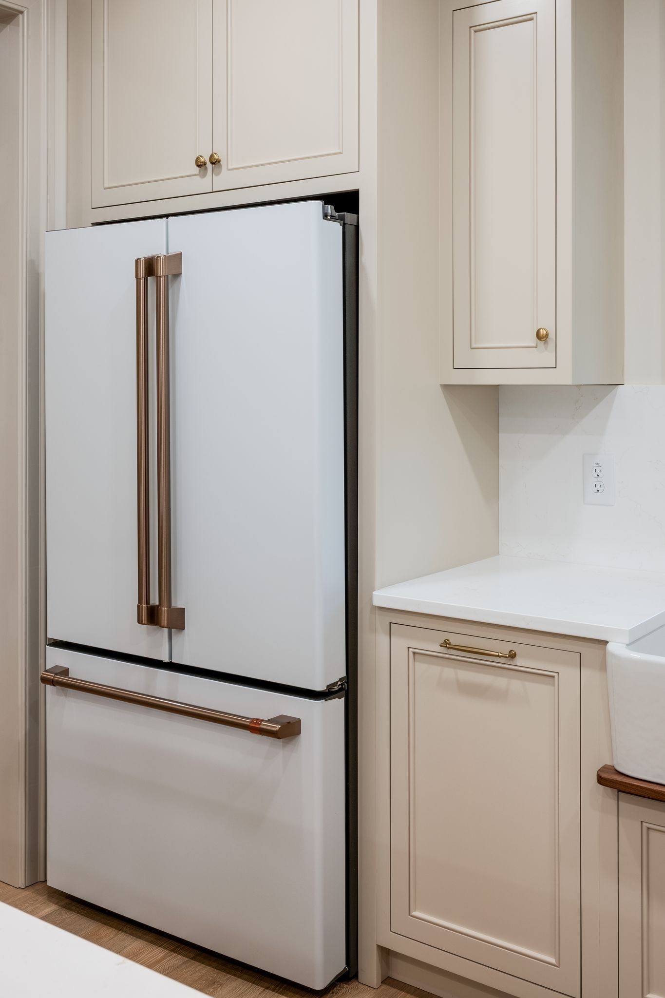 924 Hafner Road Charlotte, TN 37036 - Photo 22 of 79 a close view of a refrigerator in kitchen with white cabinets and a refrigerator