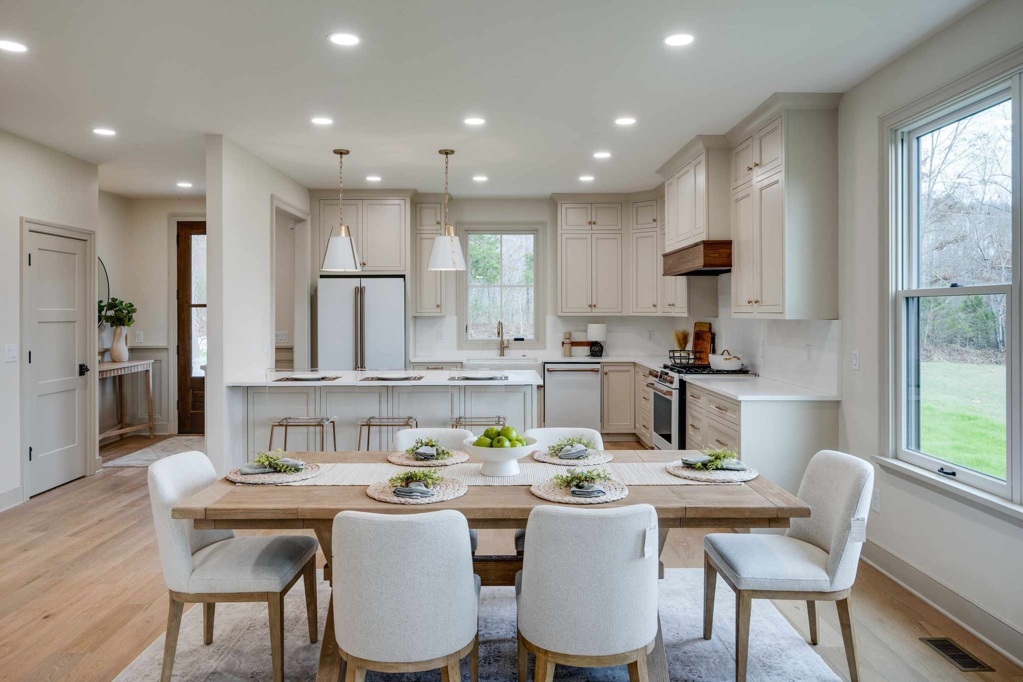 924 Hafner Road Charlotte, TN 37036 - Photo 24 of 79 a dining room with kitchen island furniture a large window and kitchen view
