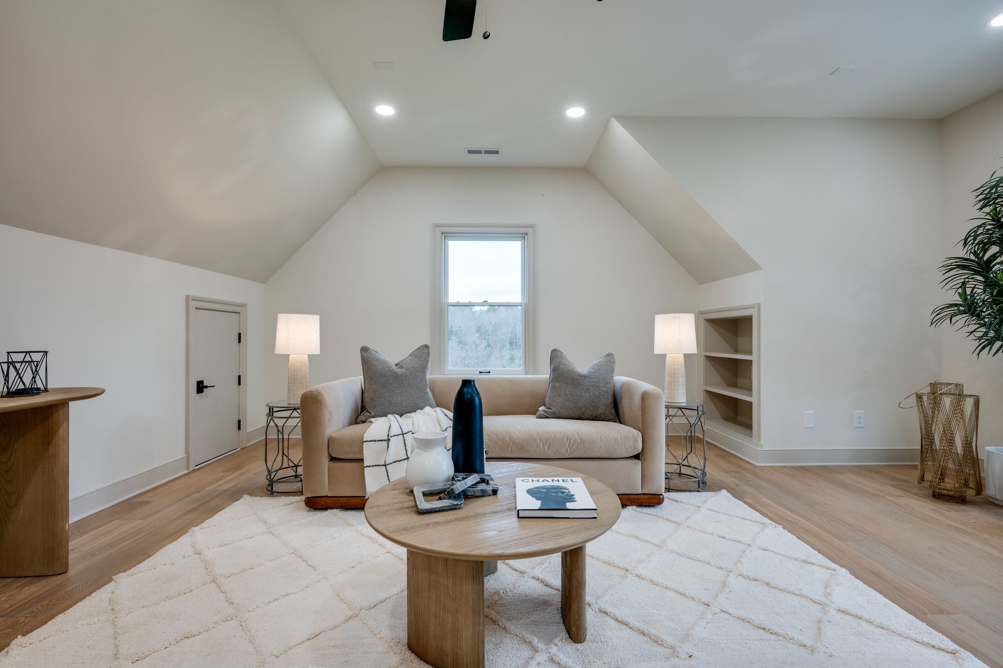 924 Hafner Road Charlotte, TN 37036 - Photo 27 of 79 a living room with furniture and a fireplace