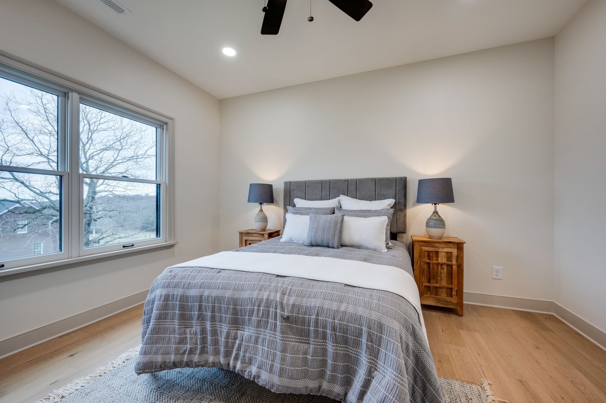 924 Hafner Road Charlotte, TN 37036 - Photo 45 of 79 a bedroom with a bed and a window