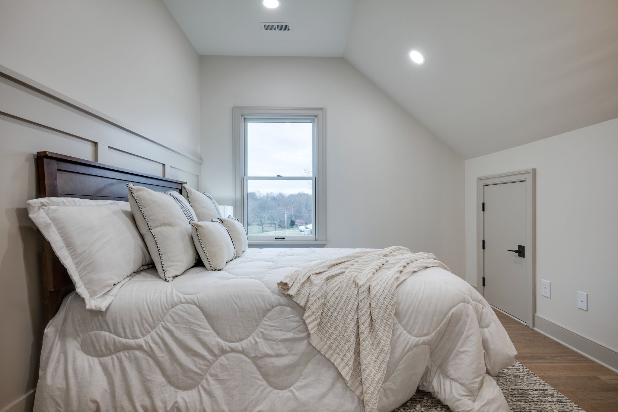 924 Hafner Road Charlotte, TN 37036 - Photo 49 of 79 a bedroom with a bed and a window